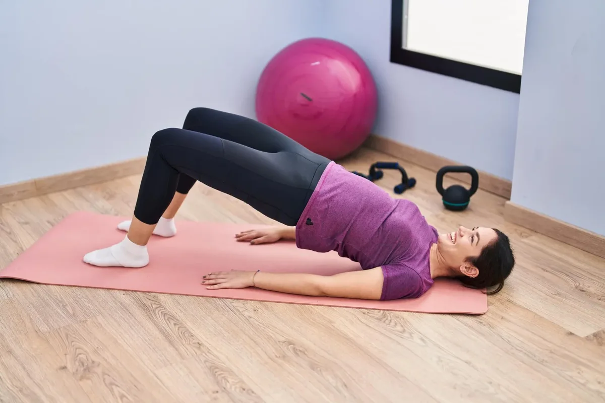 Patient performing a pelvic floor bridge exercise